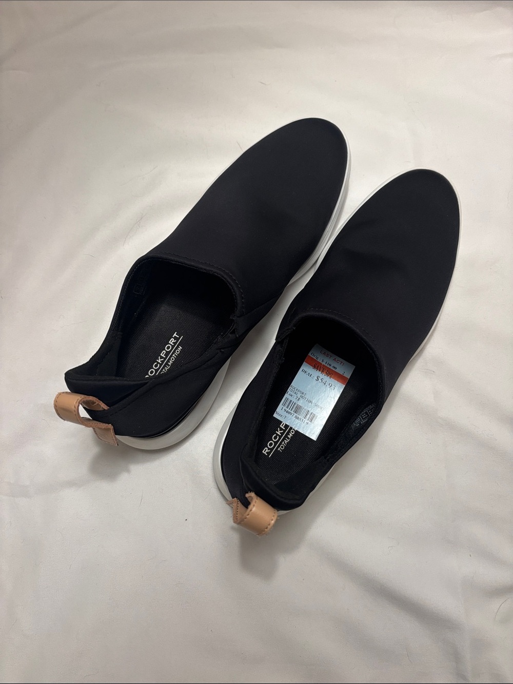 Rockport Black Slip-On Loafers with Tan Heel Tab